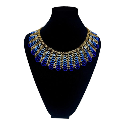 Royal Blue & Gold Scalloped Beaded Collar Necklace on velvet stand, handmade Colombian glass bead necklace by Zenú women