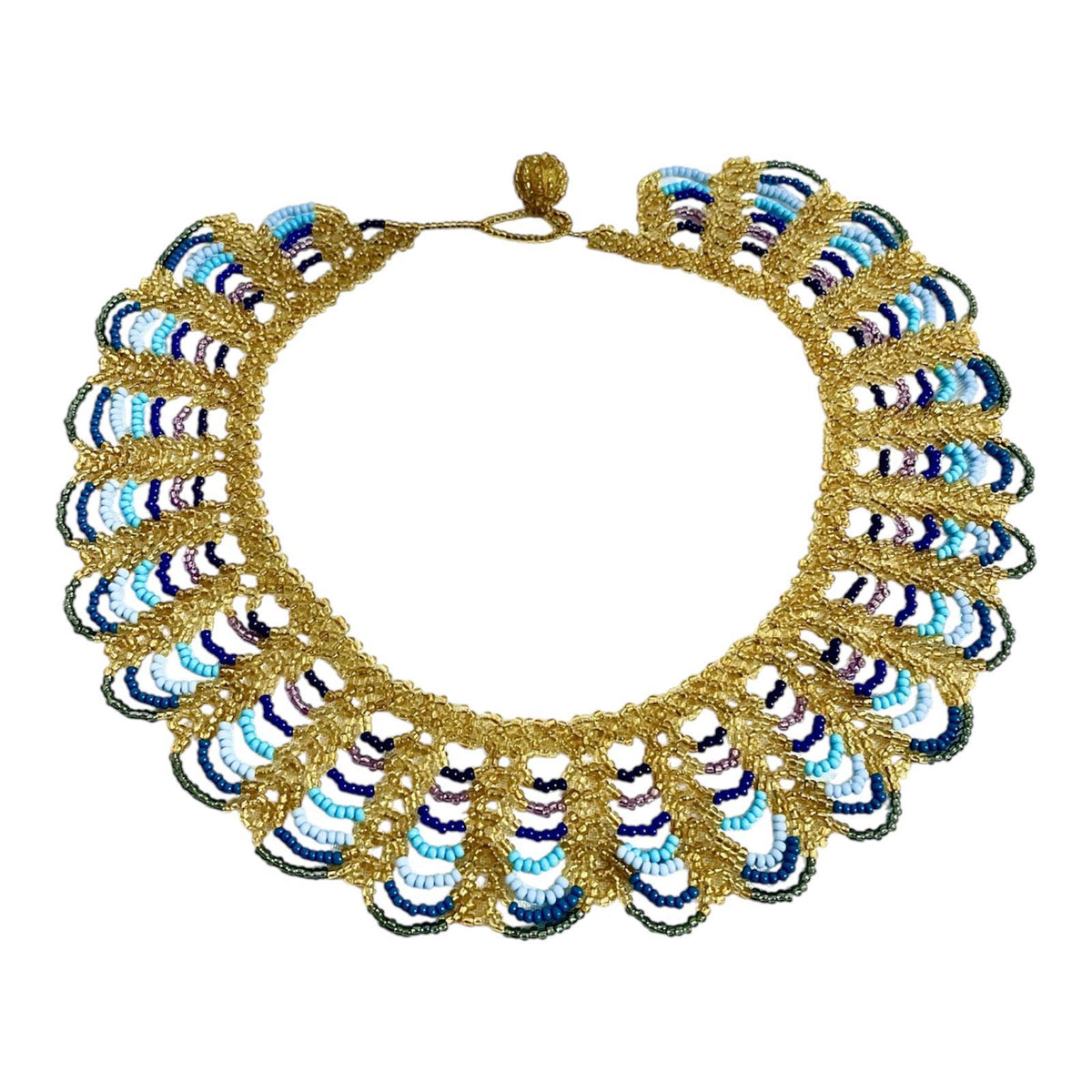 Peacock Blue & Gold Scalloped Beaded Collar Necklace laid flat on white, handmade Colombian glass bead necklace by Zenú women