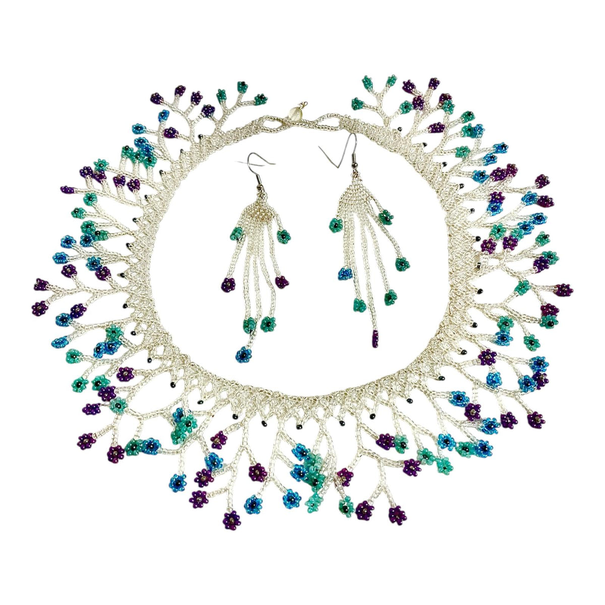 Silver & Teal Blossom Fringe Beaded Collar Necklace laid flat with matching earrings, handmade Colombian glass bead necklace by Zenú women