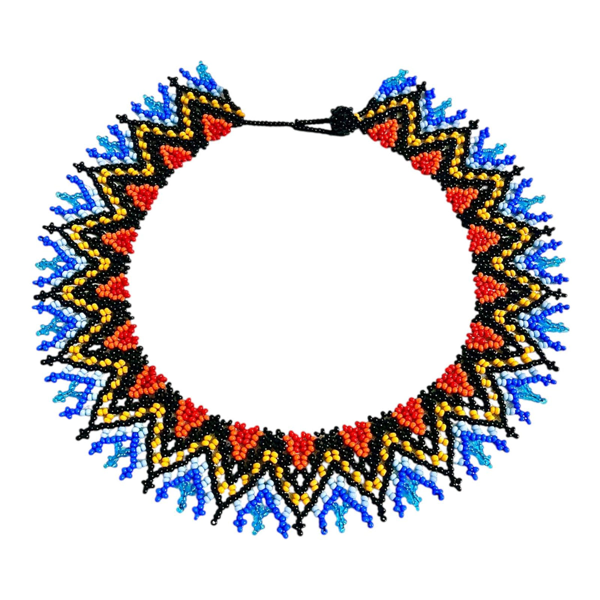 Red, Yellow & Blue Zigzag Beaded Choker Necklace laid flat on white, handmade Colombian glass bead necklace by Zenú women