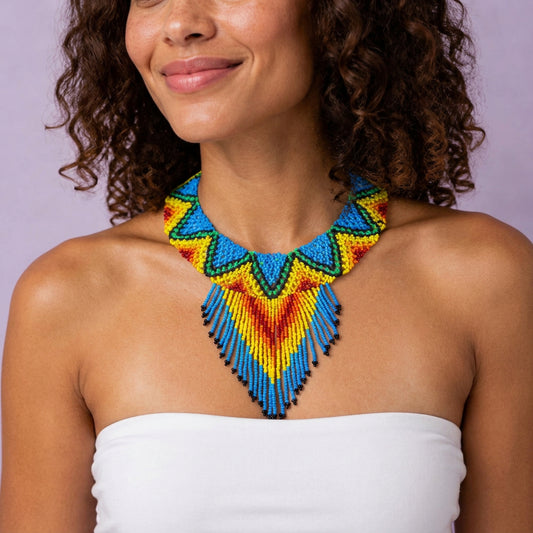 Model wearing Turquoise & Yellow Beaded Fringe Bib Necklace, handmade Colombian glass bead necklace