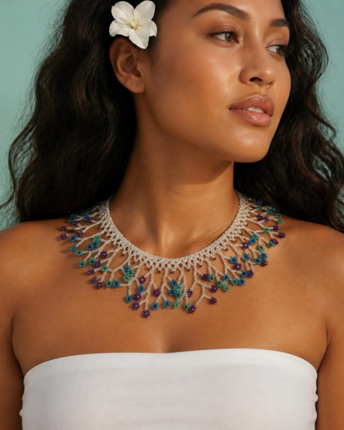 Model wearing Silver & Teal Blossom Fringe Beaded Collar Necklace, handmade Colombian glass bead necklace