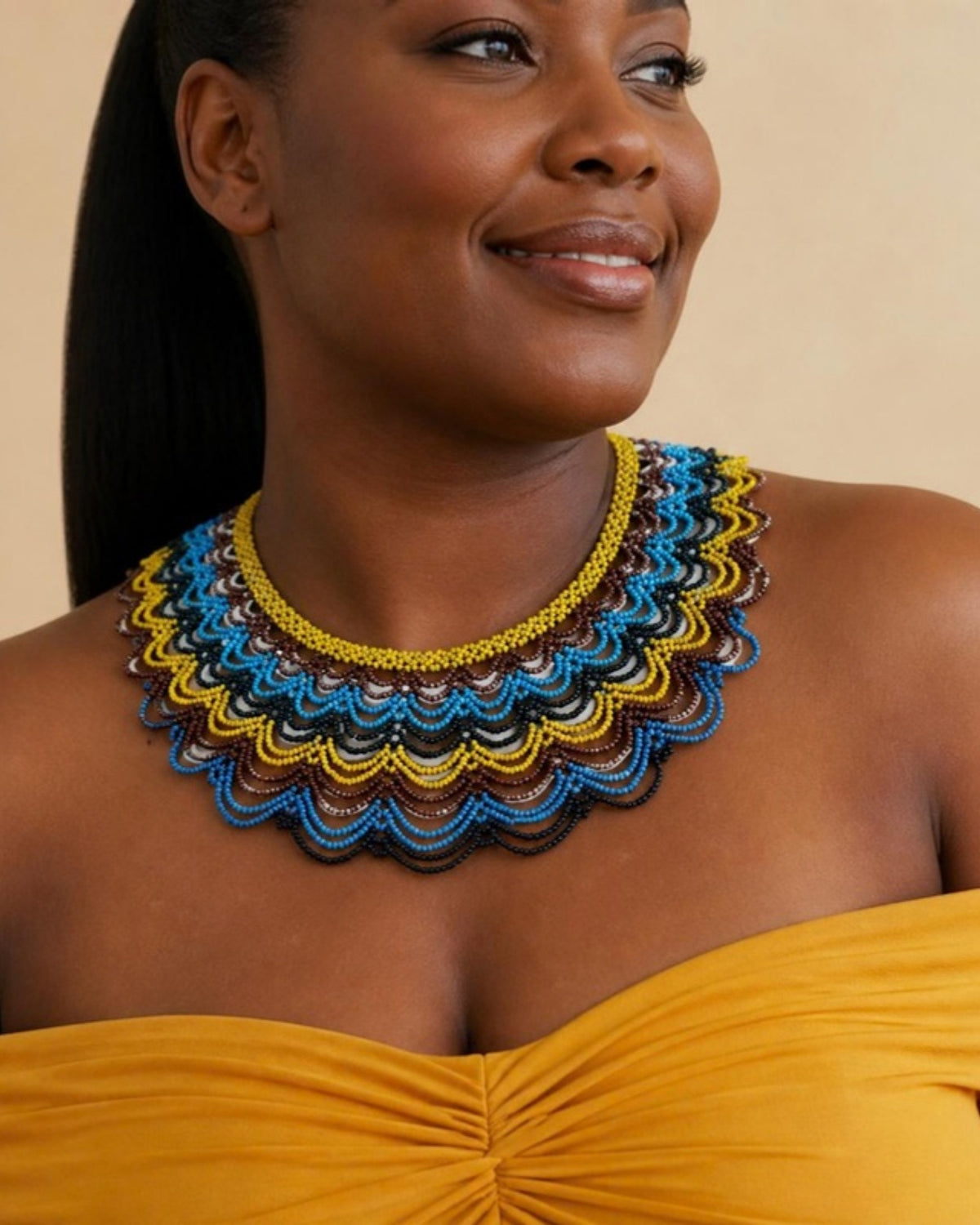 Model wearing Yellow, Blue & Brown Layered Beaded Collar Necklace, handmade Colombian glass bead necklace