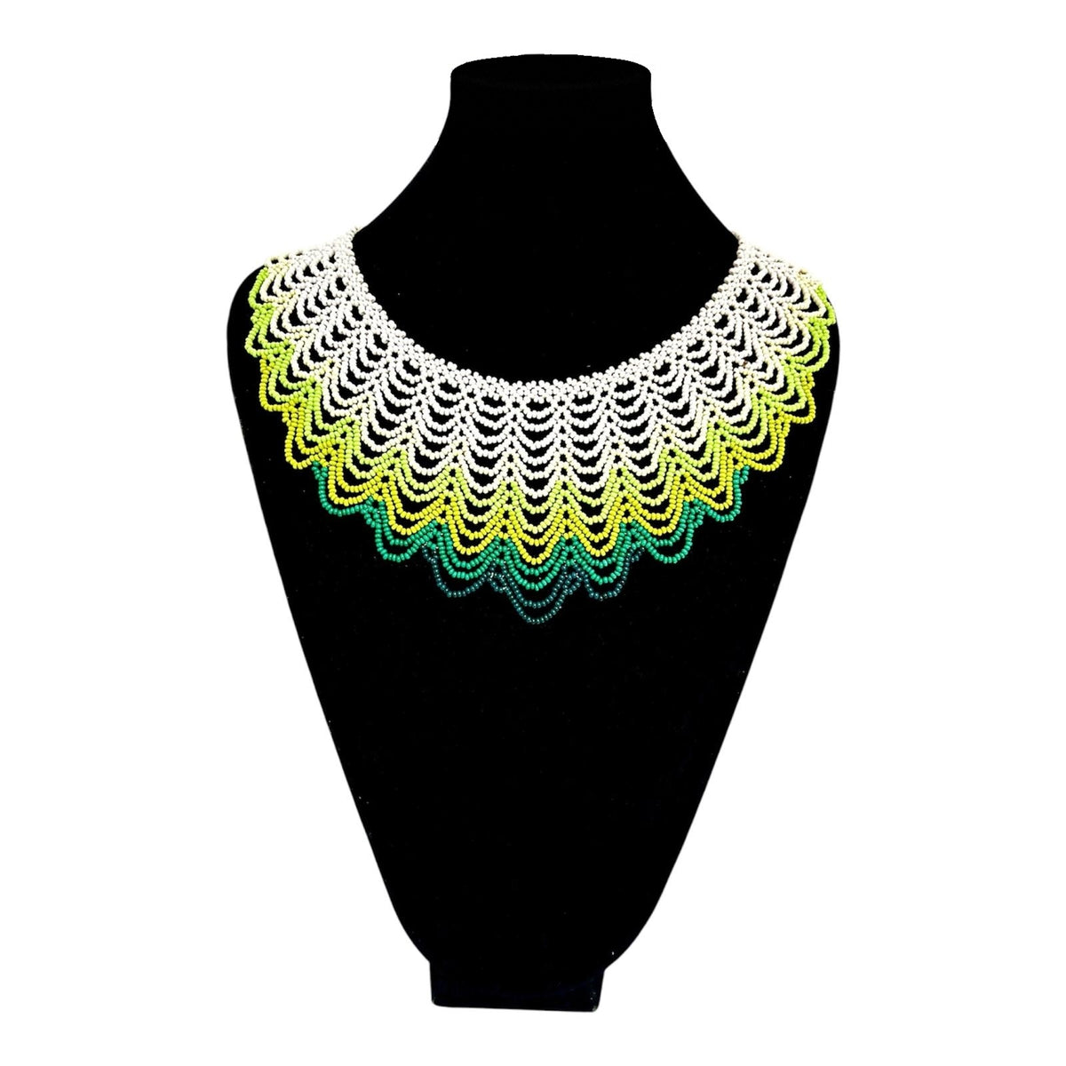 White & Green Ombré Scalloped Beaded Collar Necklace on velvet stand, handmade Colombian glass bead necklace by Zenú women