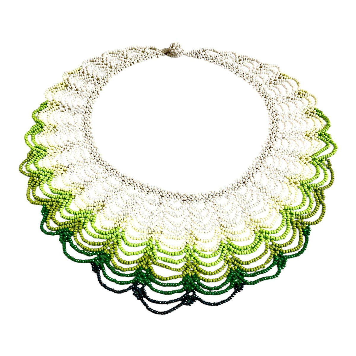 White & Green Ombré Scalloped Beaded Collar Necklace laid flat on white, handmade Colombian glass bead necklace by Zenú women
