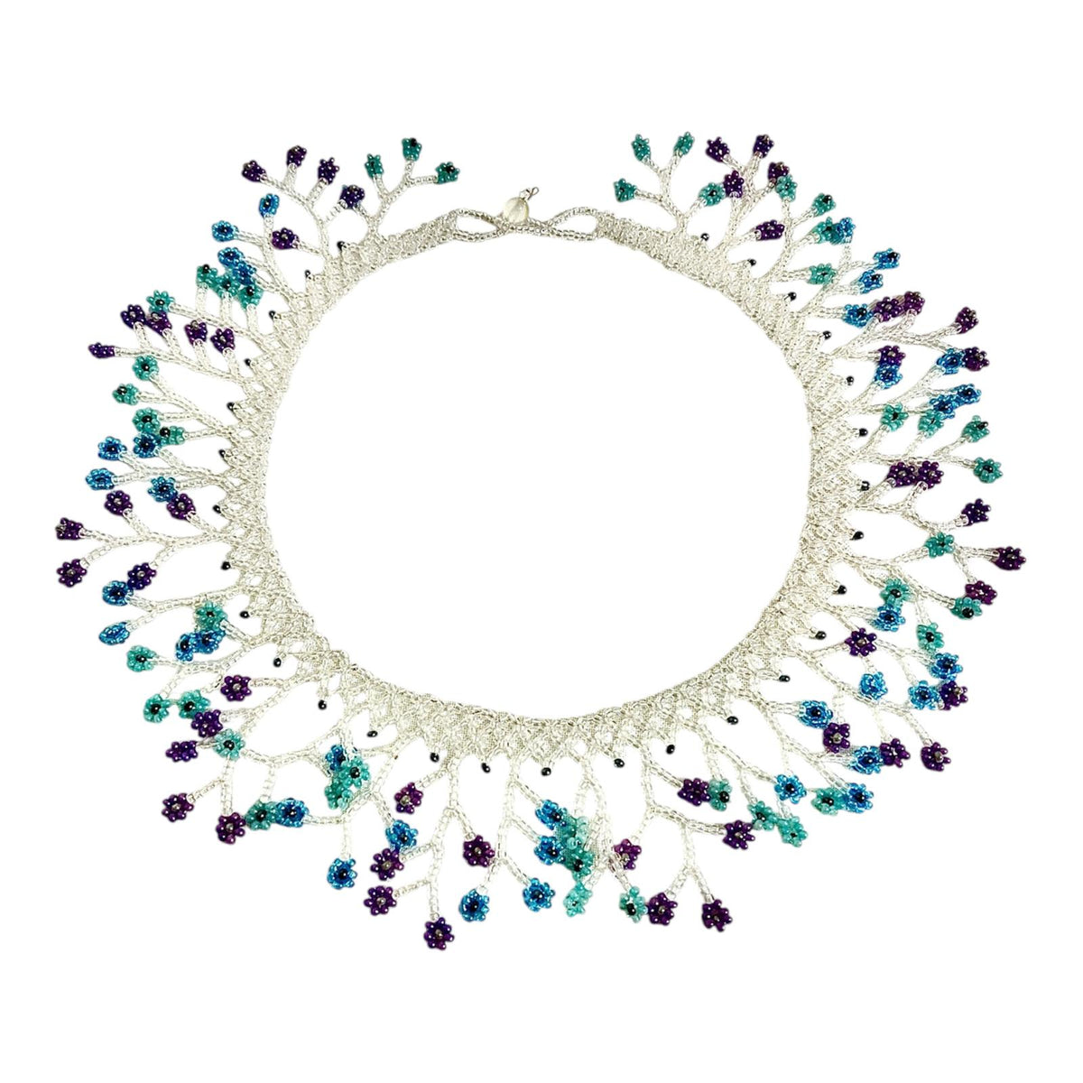 Silver & Teal Blossom Fringe Beaded Collar Necklace laid flat on white, handmade Colombian glass bead necklace by Zenú women